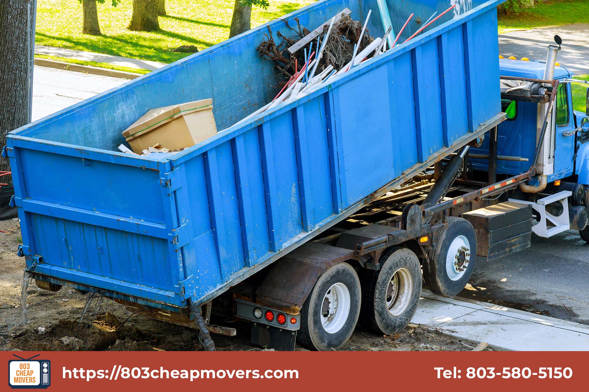 blue roll off dumpster on trailer.jpg