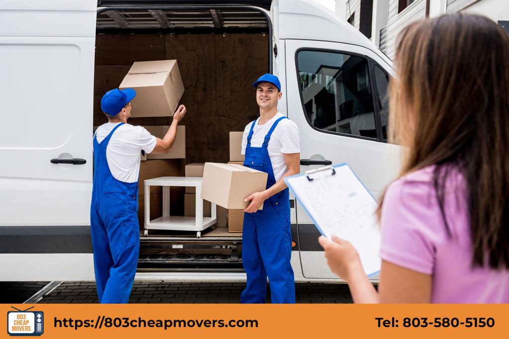 client reviewing checklist with moving crew