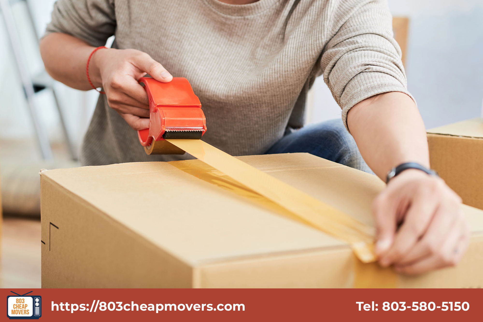 close up sealing cardboard box packing tape.jpg