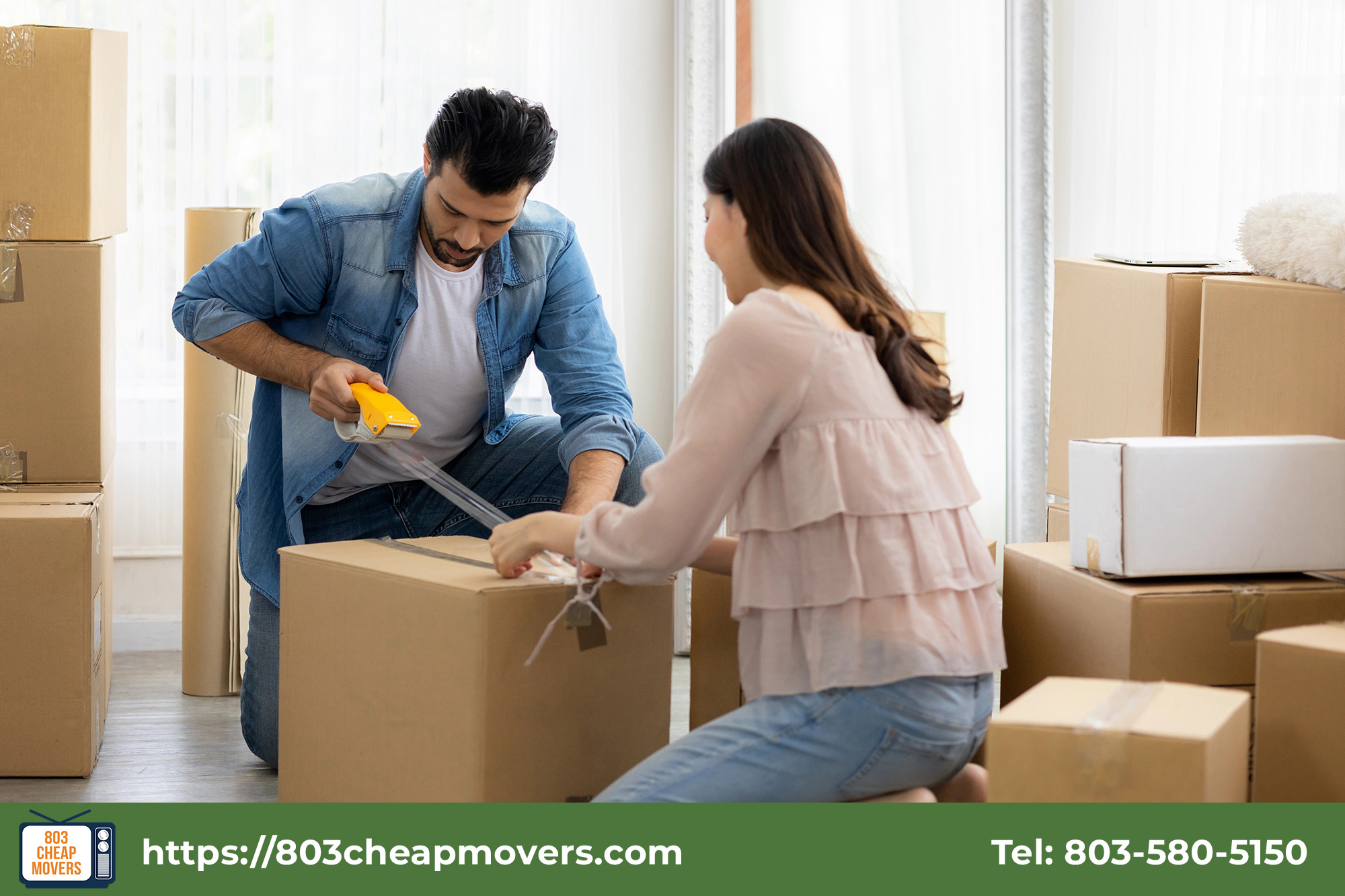 couple packing items into storage box.jpg