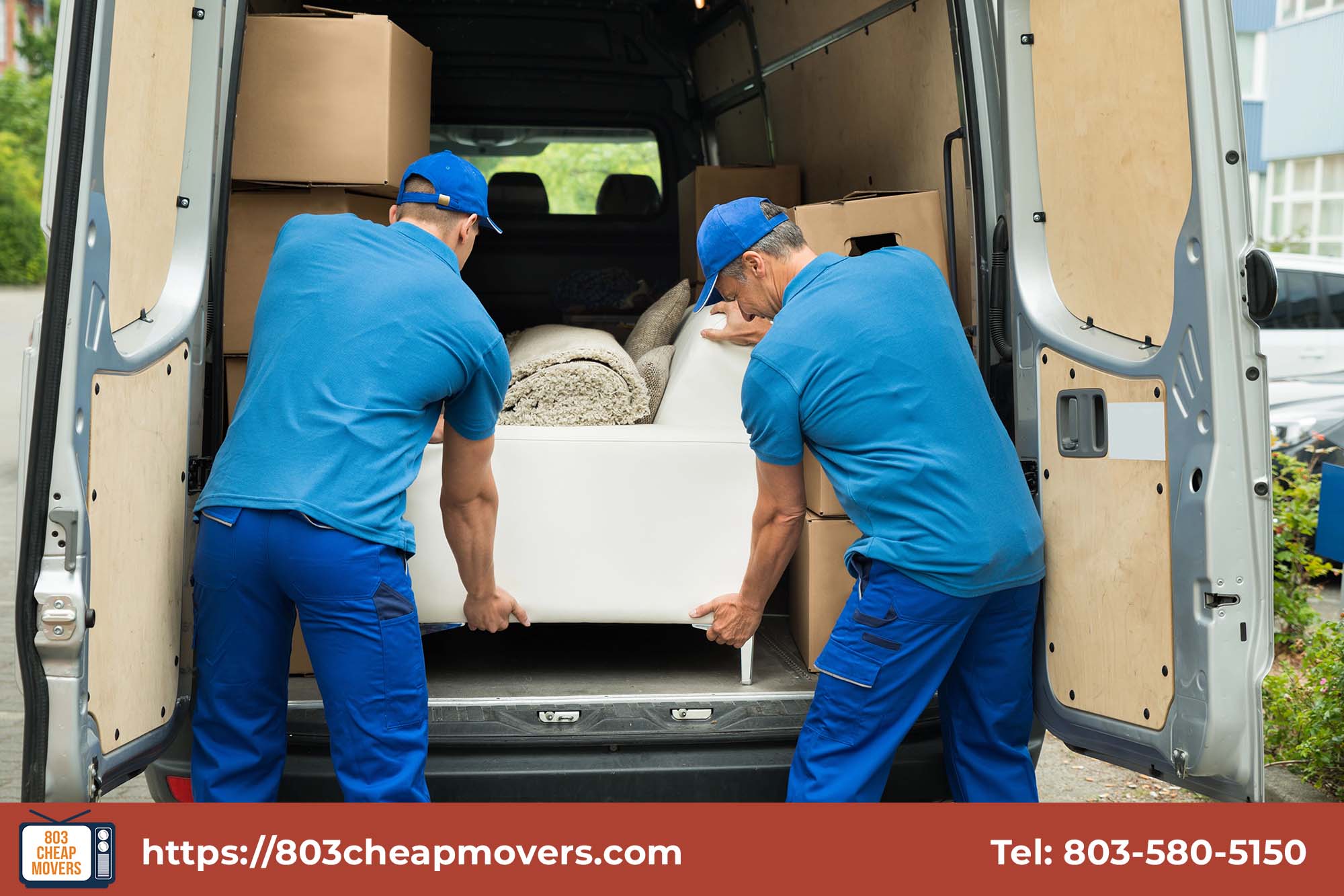 movers organizing boxes inside delivery van.jpg