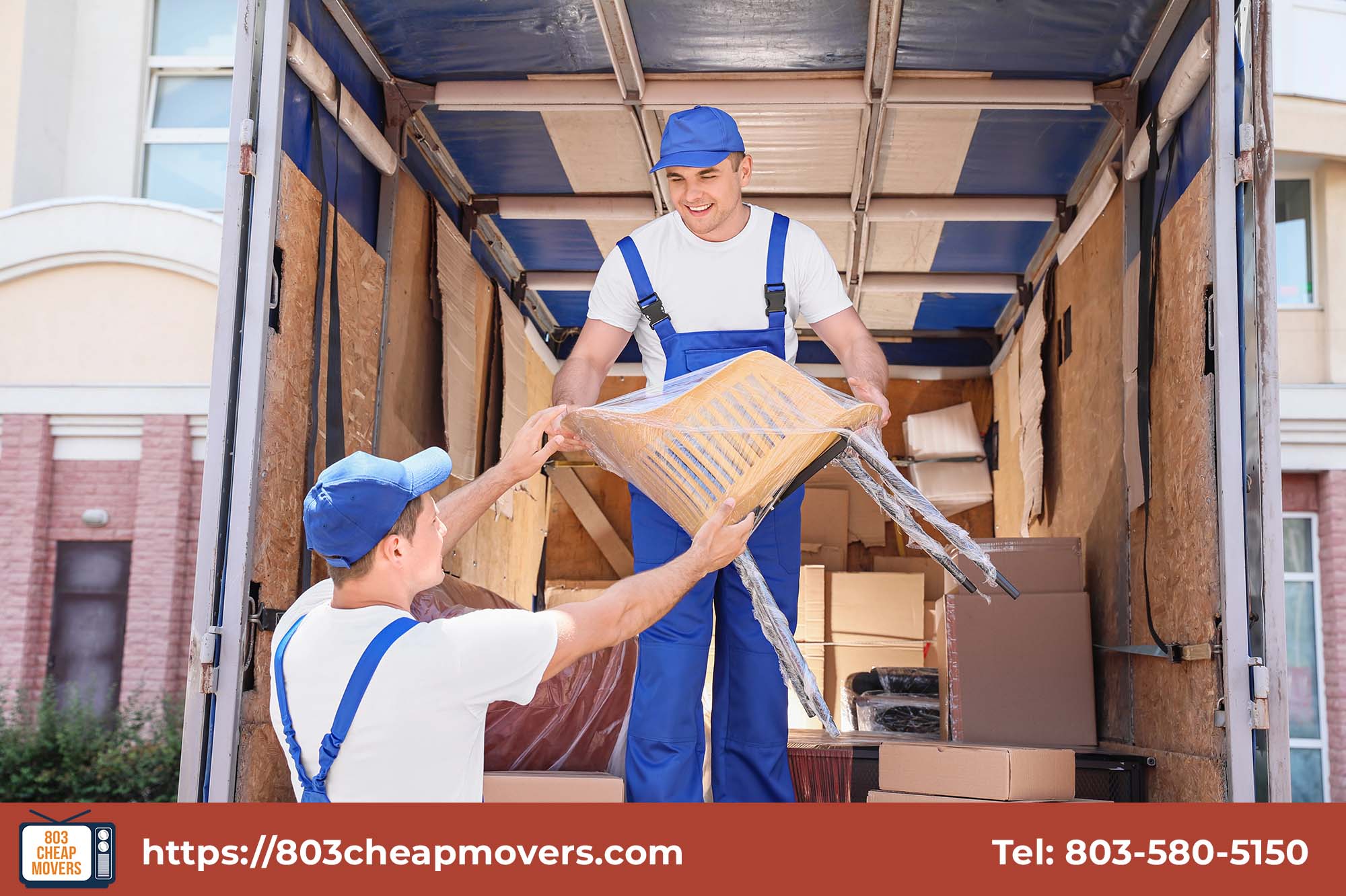 professional movers stacking boxes inside truck.jpg