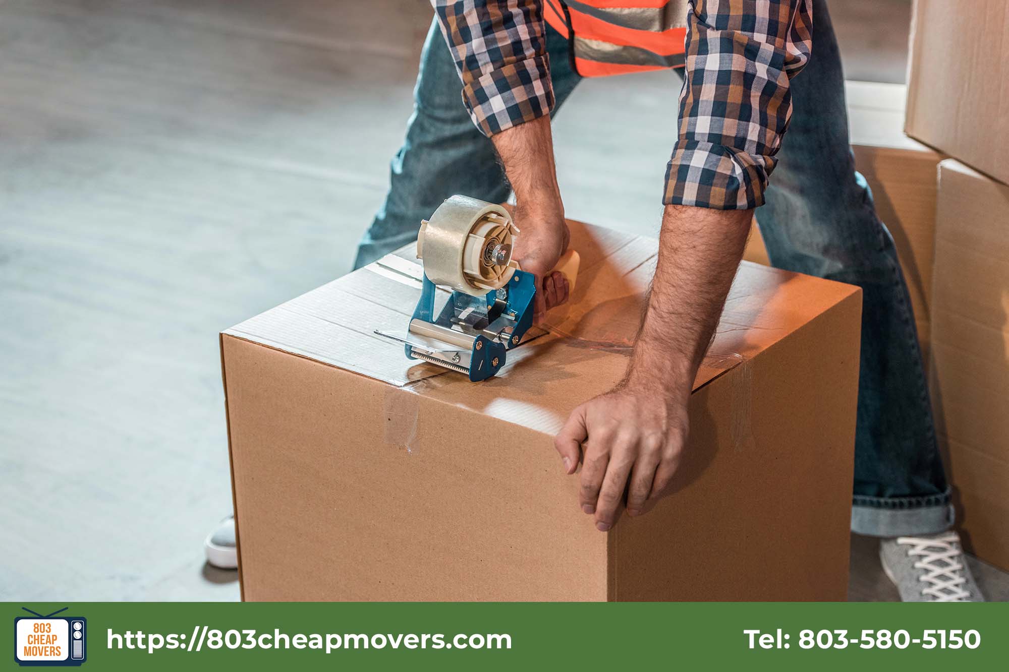 sealing cardboard box with tape for storage.jpg